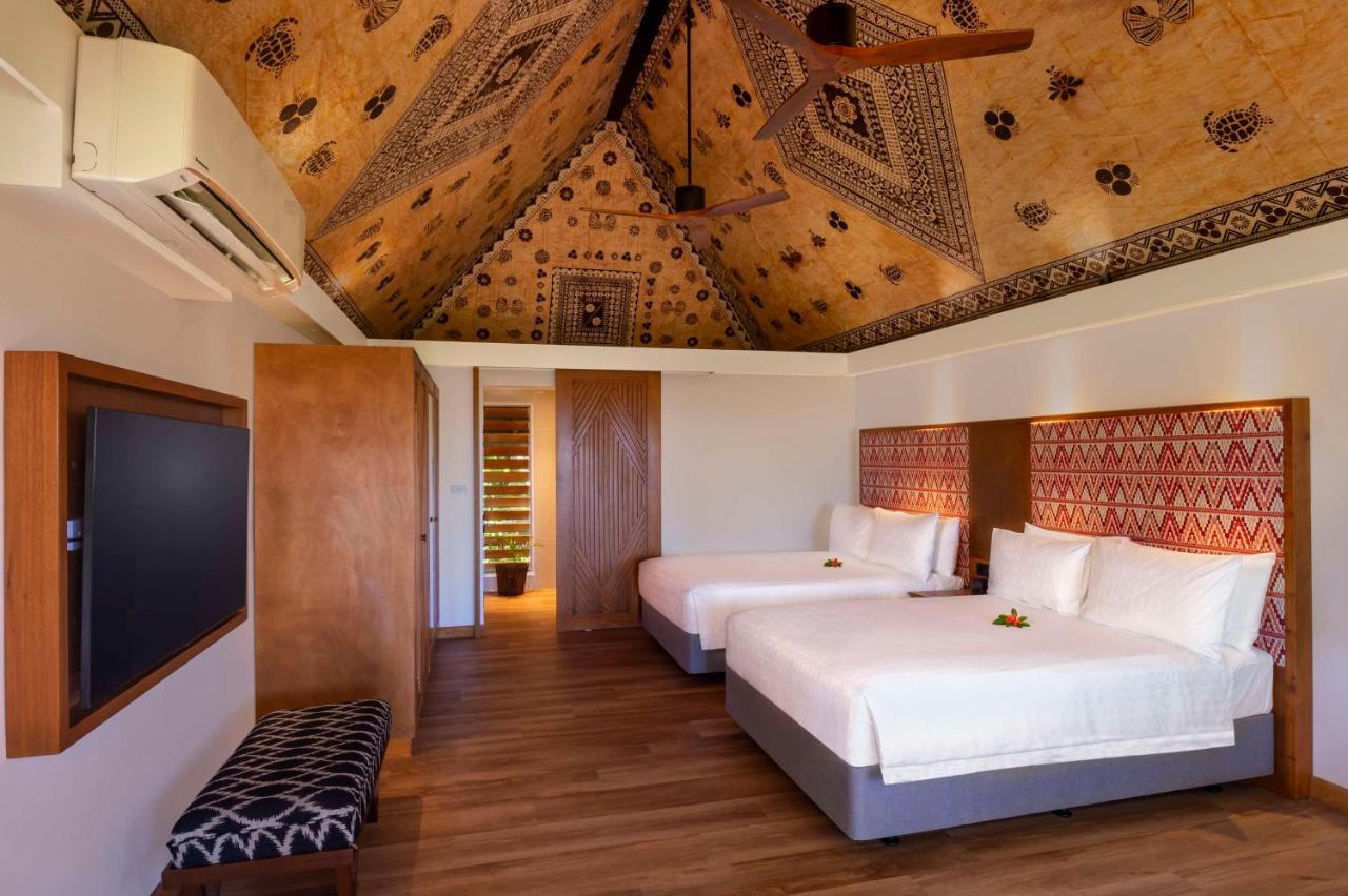 קורוטוגו Outrigger Fiji Beach Resort מראה חיצוני תמונה A bedroom at the Sheraton Resort Fiji